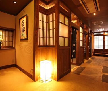 Traditional wooden hallway with shoji screens at Ryokan Yamanoyu in Kumamoto, Kyushu, Japan