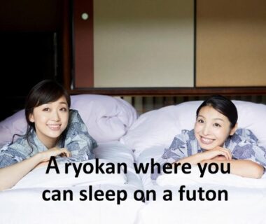 Two guests in yukata on futons in a tatami room at Miyajima-an, Hiroshima