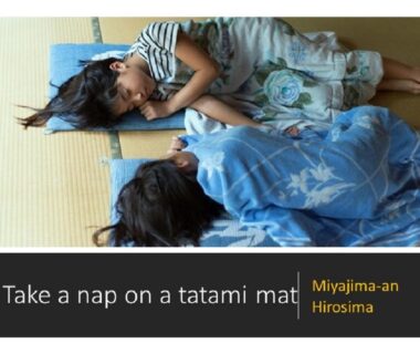 Two children resting on tatami mats in yukata at Miyajima-an ryokan in Hiroshima