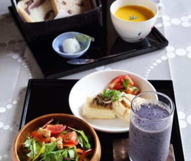 Breakfast tray with salad, bread, soup and purple smoothie at Ryokoji Temple, Kumamoto, Kyushu, Japan