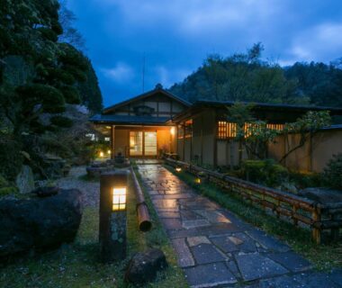 Evening lit stone path leading to Ryori Ryokan Shikanoyu in Gifu Chubu Japan