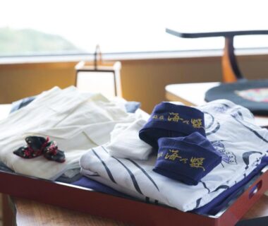 Folded yukata and socks on tray in Ryoso Uminocho ryokan room, Mie, Kansai