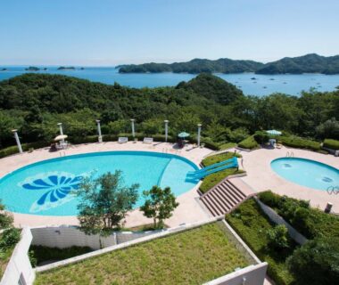 Two outdoor pools on terraced grounds overlooking islands and the sea at Ryoso Uminocho in Mie, Kansai