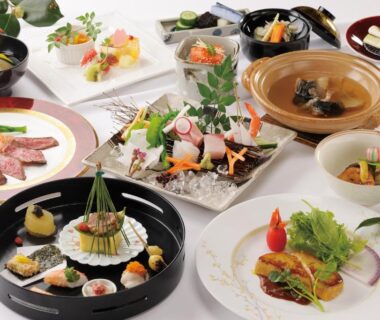 Assorted multi-course Japanese dishes on lacquer trays and ceramics at Ryotei Hanayura, Hokkaidō