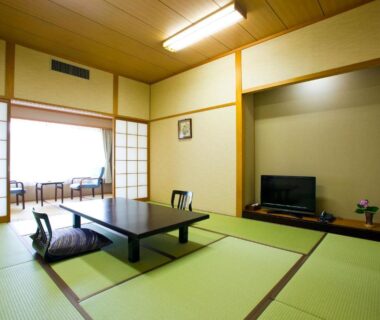 Tatami room with low table, shoji doors and veranda at Ryouri no yado Ginrin in Mie, Kansai