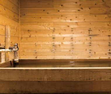 Indoor wooden soaking tub with faucet at Ryuudo, Gunma, Kantō