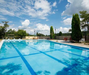 Outdoor swimming pool with lounge chairs at SPA TERRACE Shisui in Hyōgo, Kansai