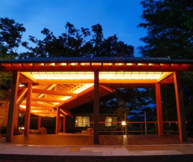 Warmly lit wooden entrance pavilion at SPA TERRACE Shisui in Hyōgo, Kansai