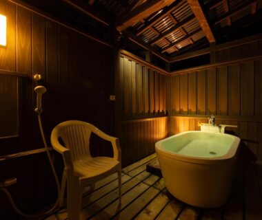 Freestanding soaking tub in wooden bath area at Saikatei Jidaiya in Yamagata, Tohoku