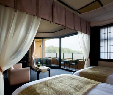 Interior of twin canopy room with shoji screens and balcony at Saiou no Miya, Mie, Kansai