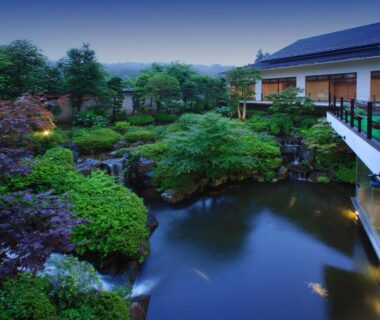 Tranquil reflective pond and landscaped garden beside Sansatei ryokan balcony in Miyagi Tōhoku Japan