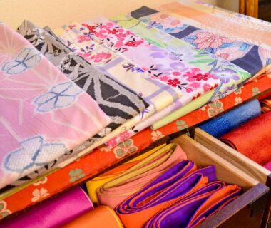 Colorful folded yukata and obi at Sanso Matsuya, Ōita, Kyūshū, Japan