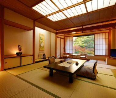 Tatami room with low table, shoji screens and garden view at Sansuiso Tsuchiyu Spa Fukushima