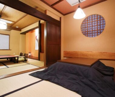 Tatami mats, futon and low table in Sawaemon ryokan room, Chūbu Nagano Japan