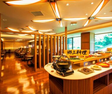 Buffet dining area with wooden partitions at Seiryukaku ryokan in Iwate, Tōhoku, Japan