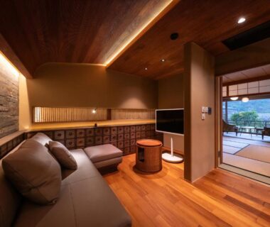 Wooden lounge opening to tatami room through shoji screens at Sekitei, Chūgoku, Hiroshima Japan