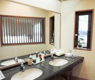 Double sinks and mirror with toiletries at Senso Yutagawa, Yamagata Tōhoku, Japan