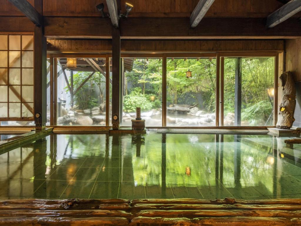 Indoor Onsen Bath at Setsugetsuka Kanagawa Indoor onsen bath with garden view at Setsugetsuka in Kanagawa, Japan