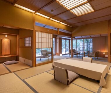 Spacious tatami room with low table and shoji screens at Shaga-no-Sato Yumeya, Niigata, Chūbu