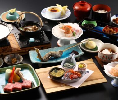 Assorted small Japanese dishes and bowls on lacquer tray for Shibu Hotel ryokan dining in Nagano