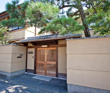Traditional wooden gate and plaster wall at Shiki Resort Kyoto Kamogawaso, Kansai
