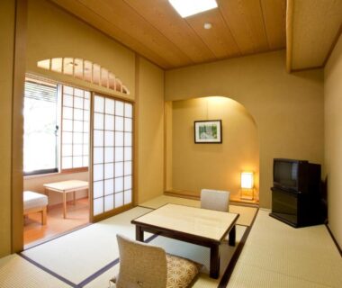 Traditional tatami room with low table and shoji screens at Shiki Resort Kyoto Kamogawaso, Kyoto