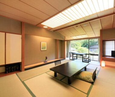 Traditional tatami room with low table and garden view at Shikitei Morioka TsunagiOnsen Iwate Tōhoku