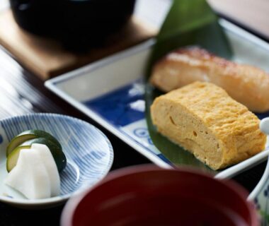 Tamagoyaki, grilled fish and pickles with lacquer soup bowl at Shima Onsen Yuzuriha in Gunma, Kanto, Japan
