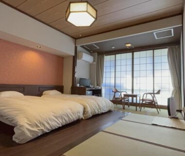 Tatami seating area, low table and twin futons at Shima Tamura in Gunma, Kantō