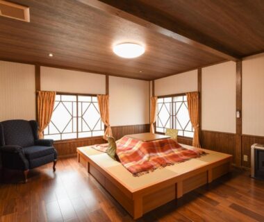 Kotatsu table with blanket, shoji screens and wooden interior at Shinseikan, Iwate, Tōhoku, Japan
