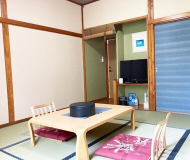 Tatami room with low table and cushions at Shinyu Onsen Kurikomaso in Miyagi, Tōhoku