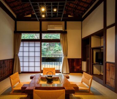 Tatami room with low table and shoji screens at Shirakabe, Shizuoka