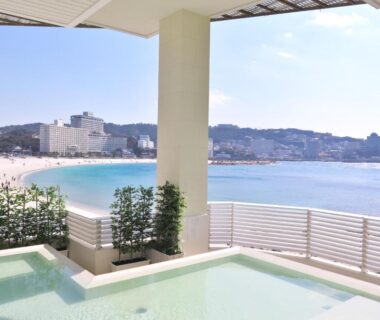 Outdoor terrace baths overlooking Wakayama bay and beach at Shiraraso Grand Hotel