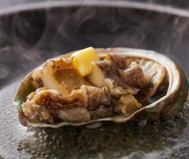 Steaming abalone with butter on shell, Shiraraso Grand Hotel, Wakayama