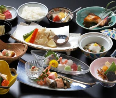 Assorted Japanese small dishes with sashimi and grilled fish, served at Shitanda ryokan, Gifu, Chūbu Japan
