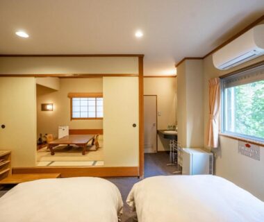 Twin beds with adjoining tatami seating and shoji at Shorenkan Yoshinoya, Kyoto Kansai Japan