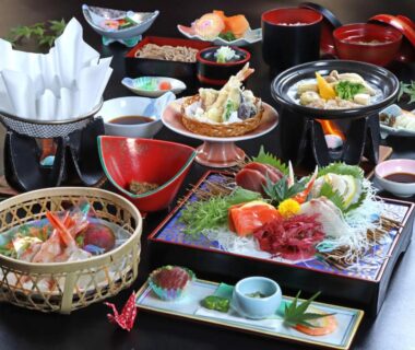 Multi-course Japanese meal with sashimi tempura and hot pot at Shugyoku no Yu Yakushido Onsen in Iwate