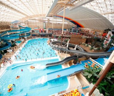 Large indoor waterpark with pools and slides at Spa Resort Hawaiians in Fukushima, Tōhoku