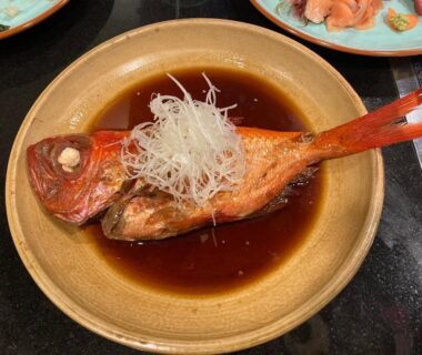 Braised whole fish in dark savory sauce at StellaMarina Atami, Shizuoka