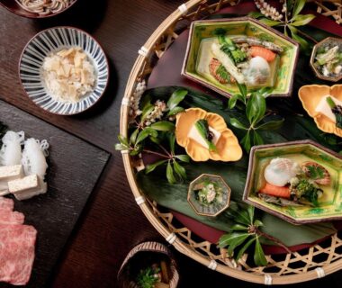 Assorted small dishes on a woven tray at Sui Suwako ryokan, Nagano Chūbu