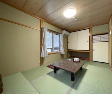 Traditional tatami room with low table and fusuma at Suisensou, Chūbu Gifu Japan