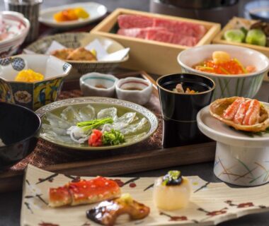 Assorted traditional ryokan dishes on lacquered tableware at Suiun in Kanagawa