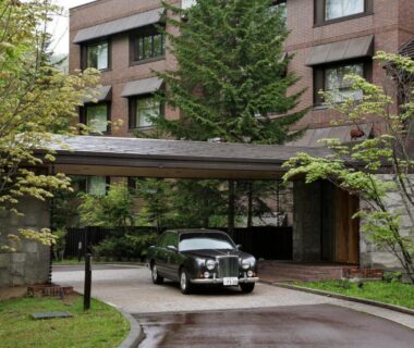 Driveway and covered entrance with classic car at Suizantei Club Jozankei-Adults Only, Hokkaidō Japan