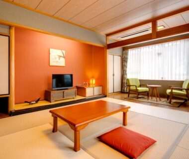 Tatami room with low table and window seating at Sundance Resort Hakone Gora in Kanagawa Japan