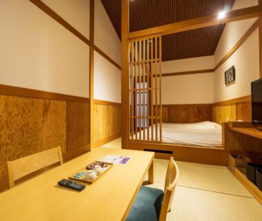 Tatami room with low table and futon area at Susukinohara Ichinoyu in Kanagawa, Kantō, Japan