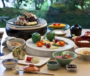 Traditional multi-course Japanese dishes arranged on a table at TAKITEI Riverside in Kanazawa, Ishikawa