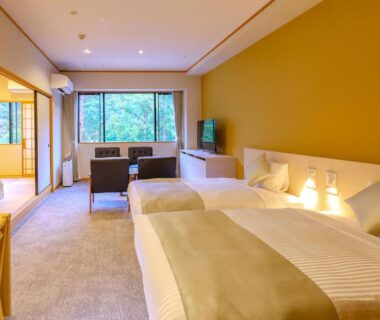 Twin beds, tatami alcove, seating area and garden-facing window at TAOYA Nasu Shiobara, Tochigi