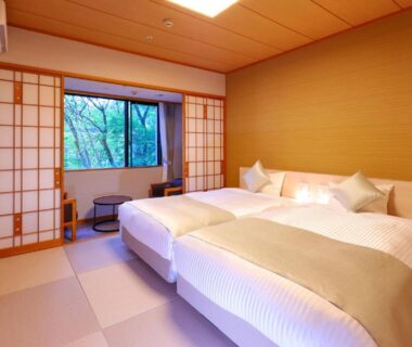 Tatami-style twin beds with shoji screens and garden-view window at TAOYA Nasu Shiobara Tochigi