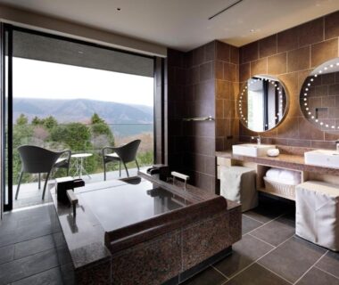 Stone soaking tub, double vanity and balcony chairs with mountain view at Hiramatsu Sengokuhara Hakone, Kanagawa