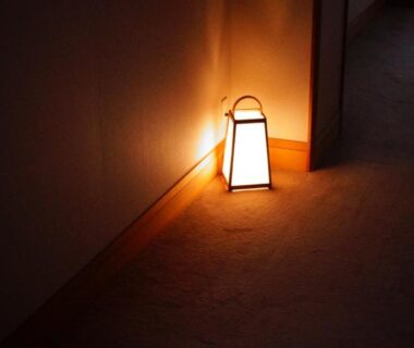 Softly glowing floor lantern in Tabist Kazeyuki hallway, Chūbu Gifu, Japan